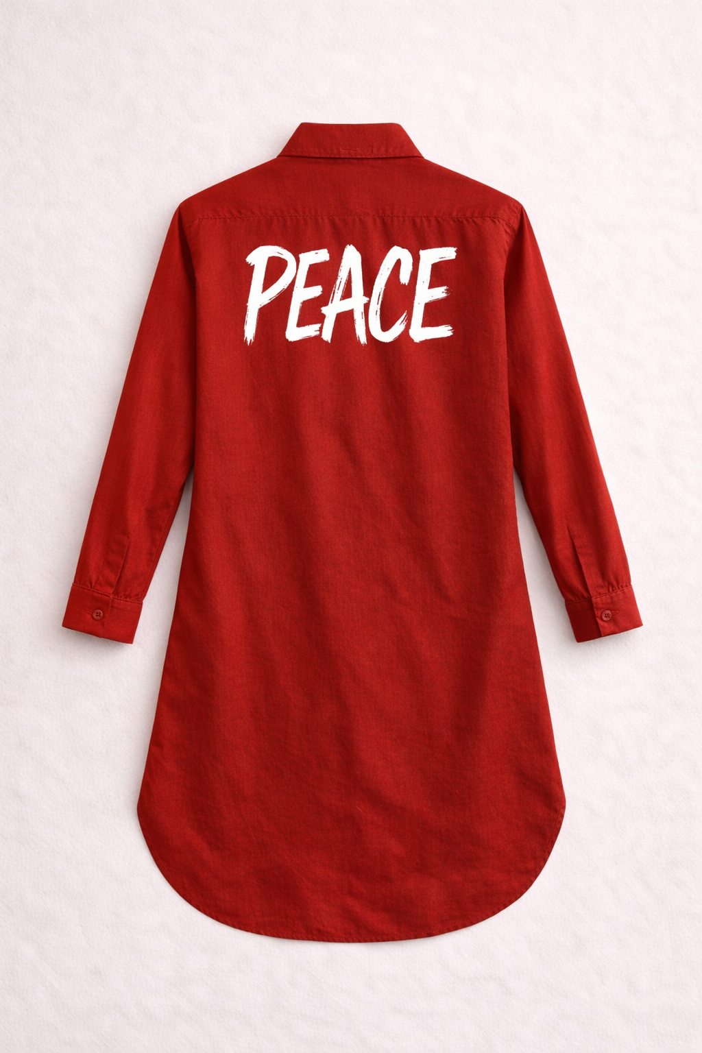 Red shirt dress with 'PEACE' printed on the back against a white background