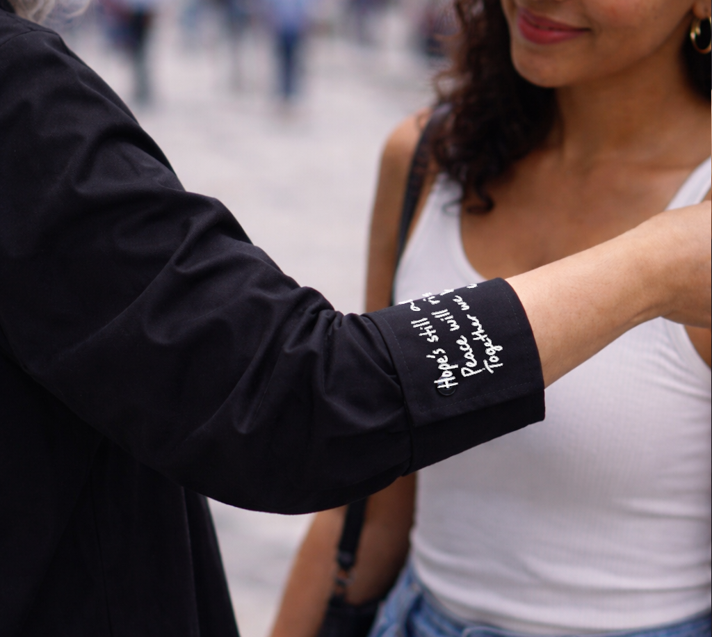 Andre Yabin  black together shirt dress words under cuff